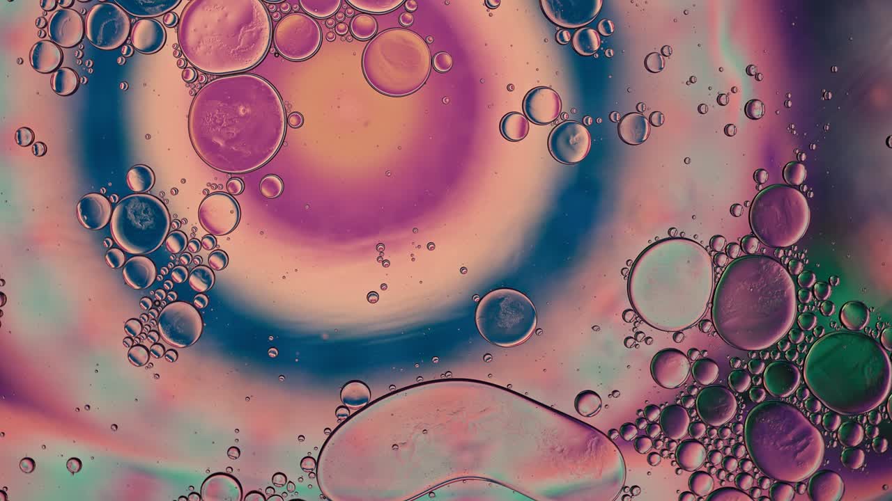 Abstract Colorful Food Oil Drops Bubbles and spheres Flowing
