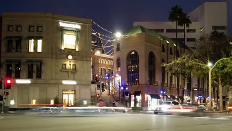 fast moving timelapse traffic light trails on downtown rodeo drive nightlife scene