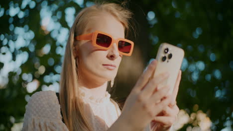 woman using phone outdoors