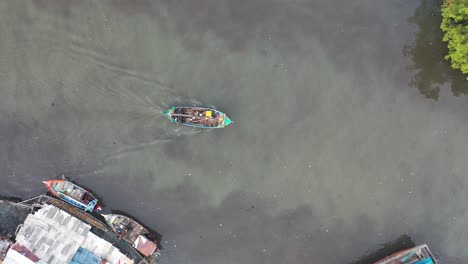 fishing boat in a mangrove river