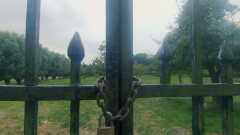 Slowmo-4K-footage-of-an-old-lock-on-the-old-gate-of-former-castle-Ter-Nisse-from-the-18th-century,-Nisse,-Zeeland,-Netherlands