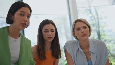 diverse group coworkers brainstorming in conference room closeup. team planning