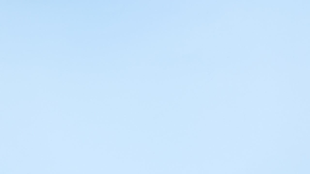 Hearts making romantic Valentine's day decoration on left side of blue theme. Stop motion