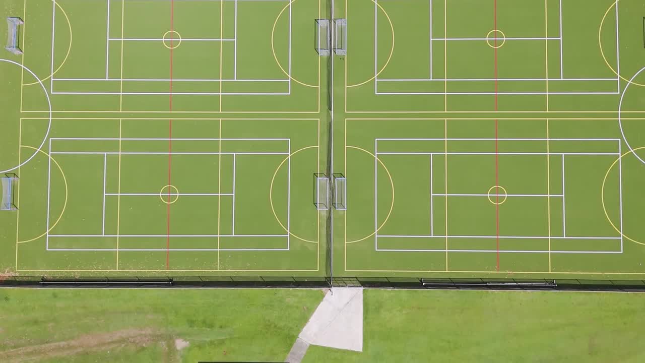 Detailed aerial shots of sports field lines and markings, showcasing symmetry and organization.