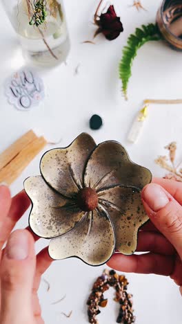 flower-shaped incense burner and wellness items
