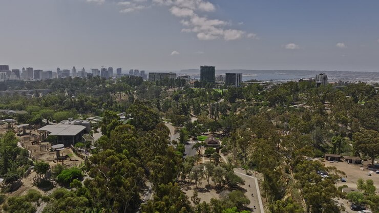 San Diego California Aerial v78 low flyover balboa park capturing affluent hilltop neighborhood bankers hill, downtown cityscape and bay views at daytime - Shot with Mavic 3 Cine - September 2022