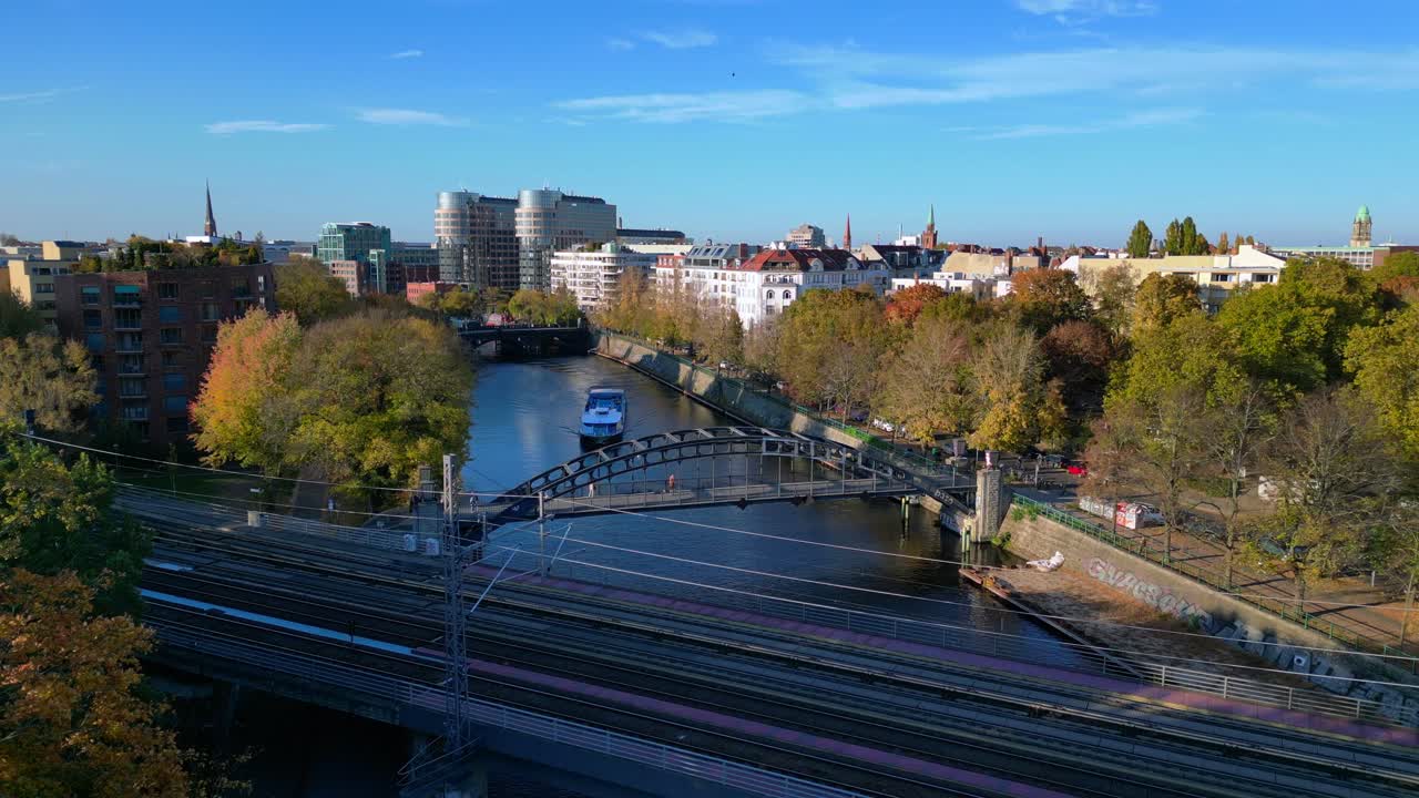 Beautiful Autumn Day in Berlin: Canal, Bridge and Cityscape