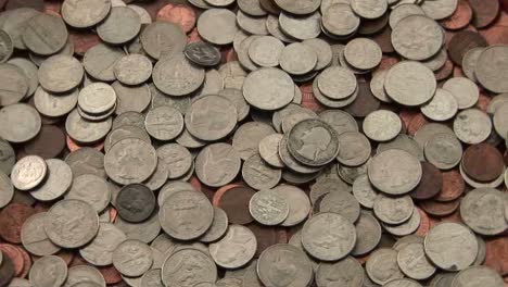 A-pile-of-coins-sits-on-a-table