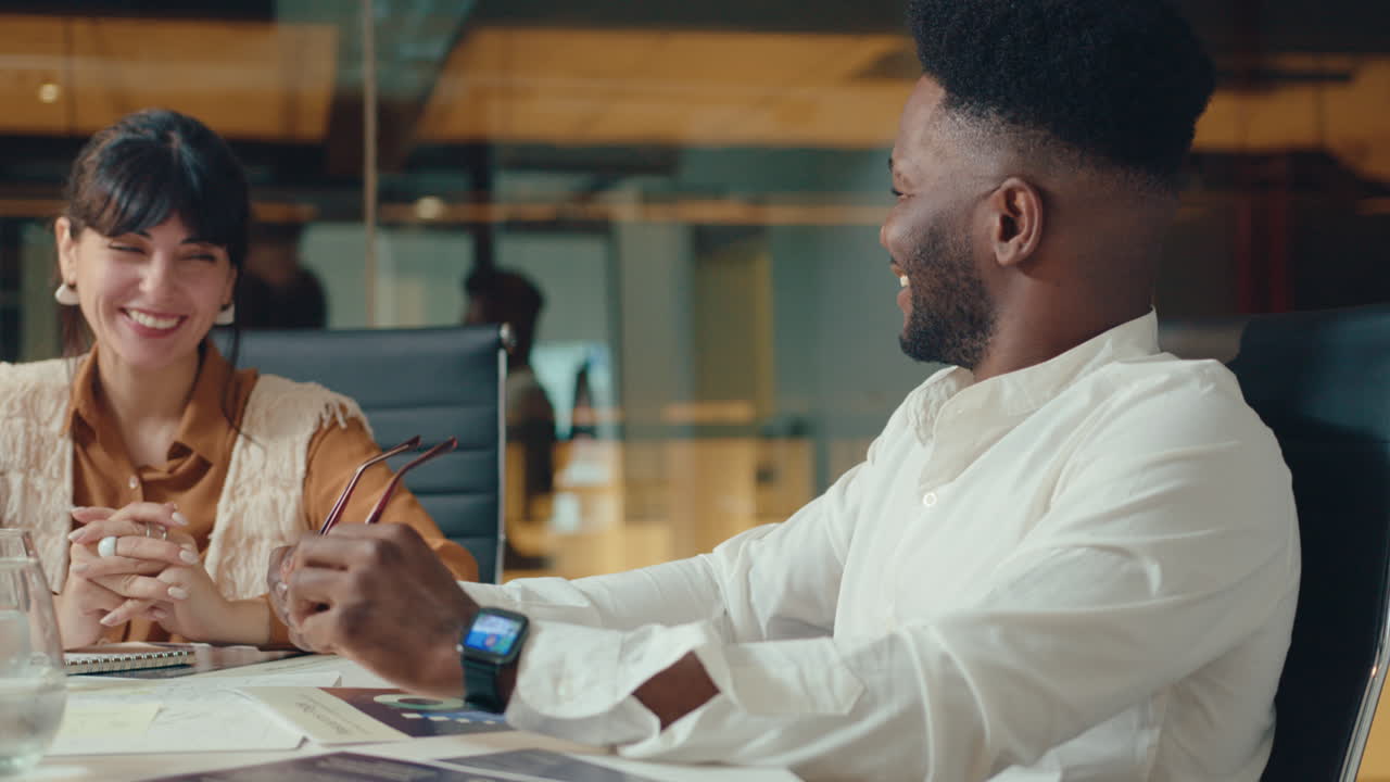 CEO and Business Team Having Talk and Smiling during Meeting