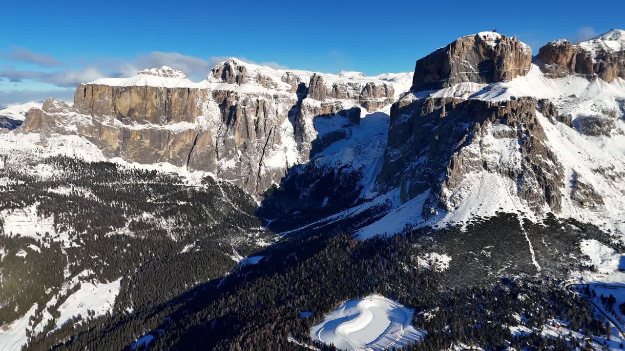 Aggressive rock formation in Italian Alps mid winter (drone footage)