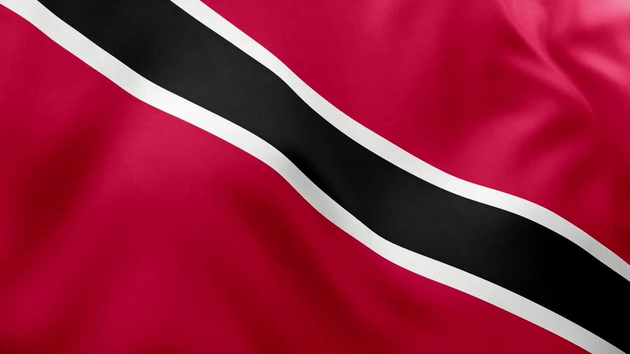 Realistic animation of Trinidad and Tobago national flag gently waving. Red field black diagonal stripe with white fimbriation. Seamless loop