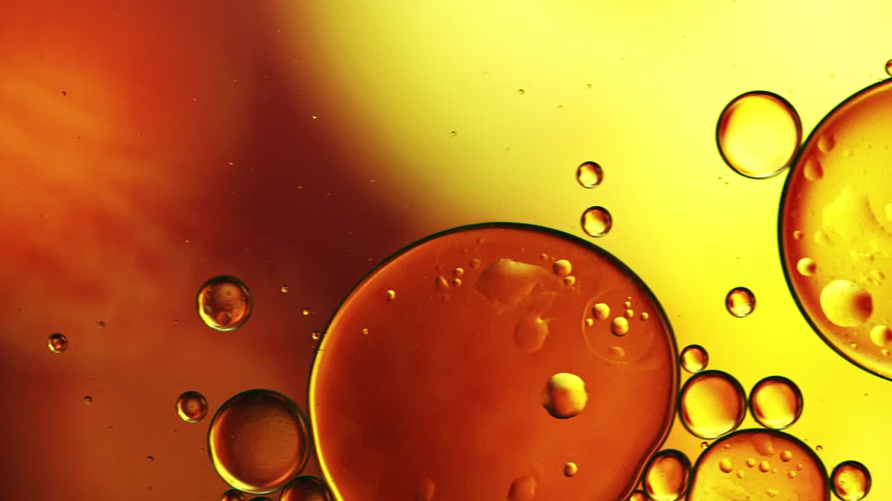 абстрактные красочные пищевые капли масла пузырьки и сферы текут