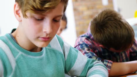 Schoolboys-working-on-electronic-project-in-classroom