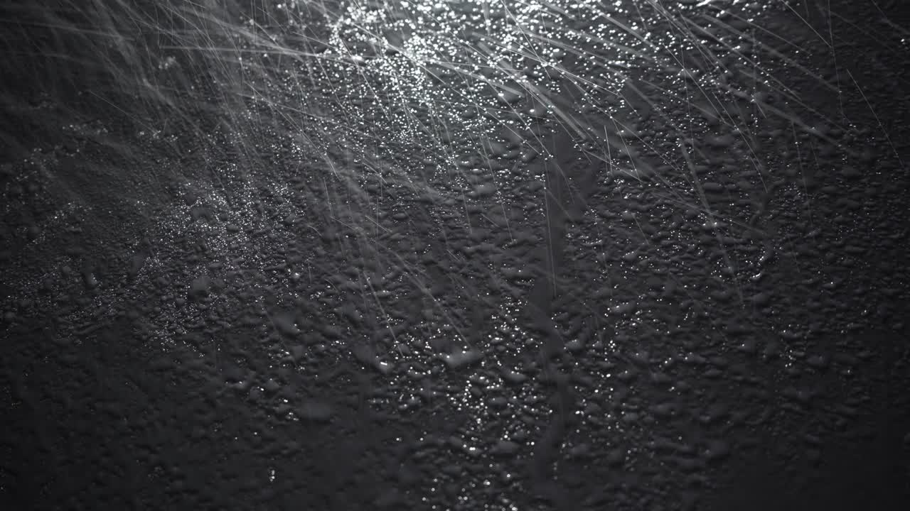 imágenes de gotas de pulverización en fondo negro