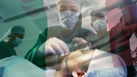 animation of flag of italy waving over surgeons in operating theatre