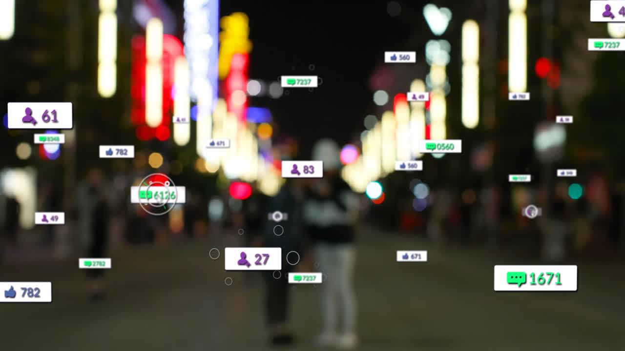 Animation of social media icons and numbers over out of focus city lights