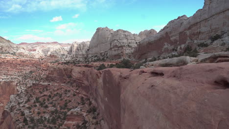 capitol reef national park mesa, utah usa, abyss under steep sandstone formation tilt up full frame