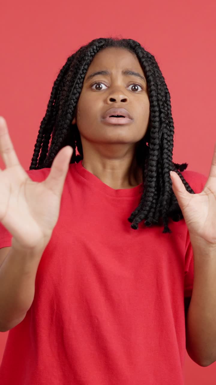 Woman expressing fear and surprise