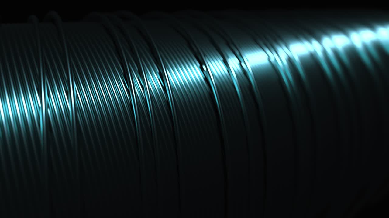 Gigantic coil with solder for automated electronics conveyor assembly.