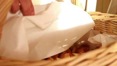 revealing the freshly baked traditional italian stuffed pastries in the wicker basket, soft natural light