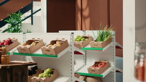 fresh fruits and veggies in crates on display at farmers market