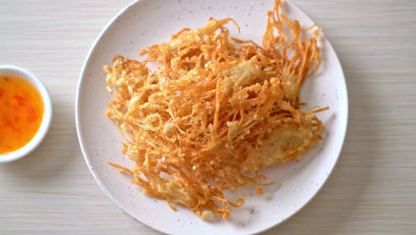 fried enoki mushroom or golden needle mushroom - vegan and vegetarian food style