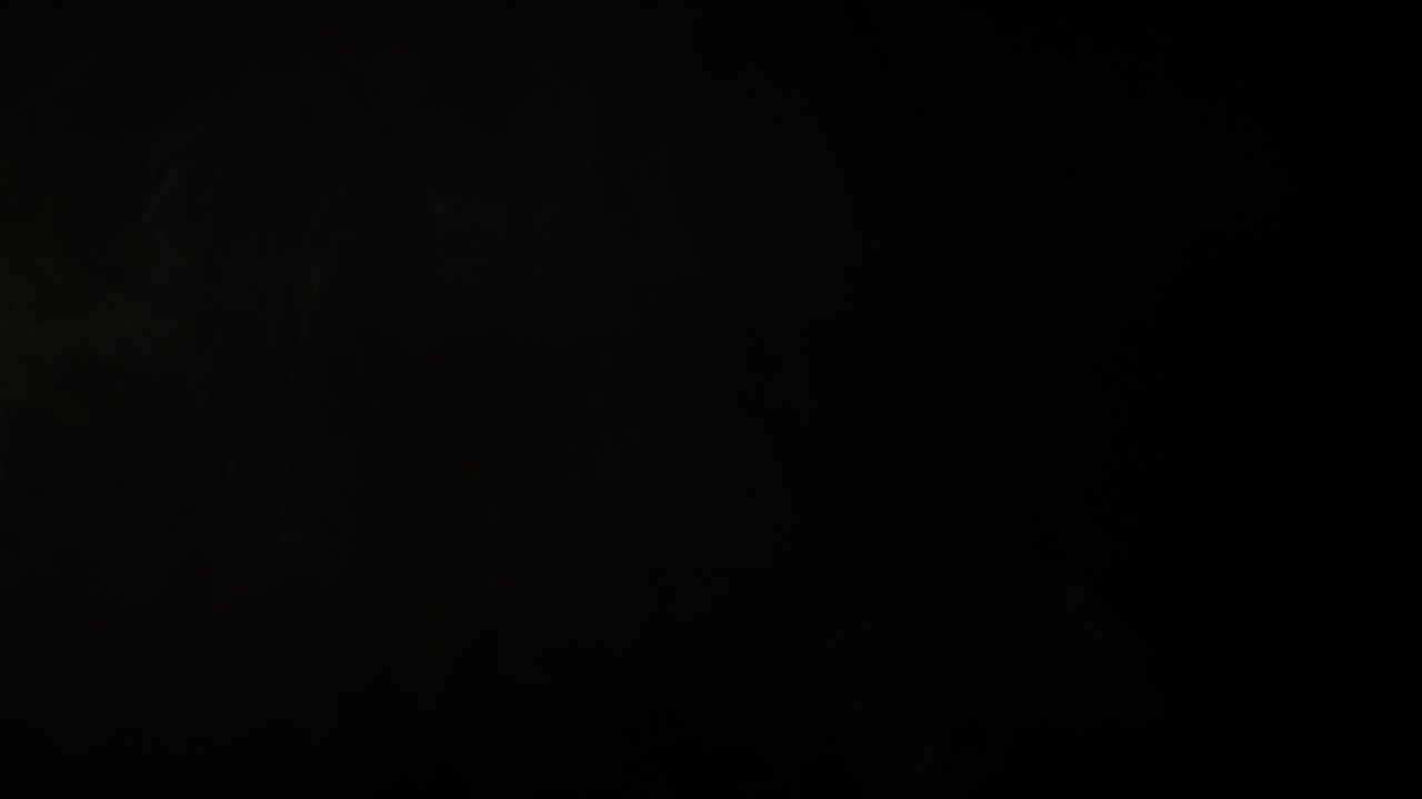 Slow Motion White Smoke Rising and Dissipating on Black Background
