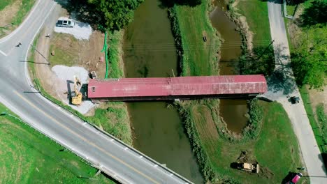 dismantling of a 174 year old burr arch truss design covered bridge, dual span in the pennsylvania dutch country