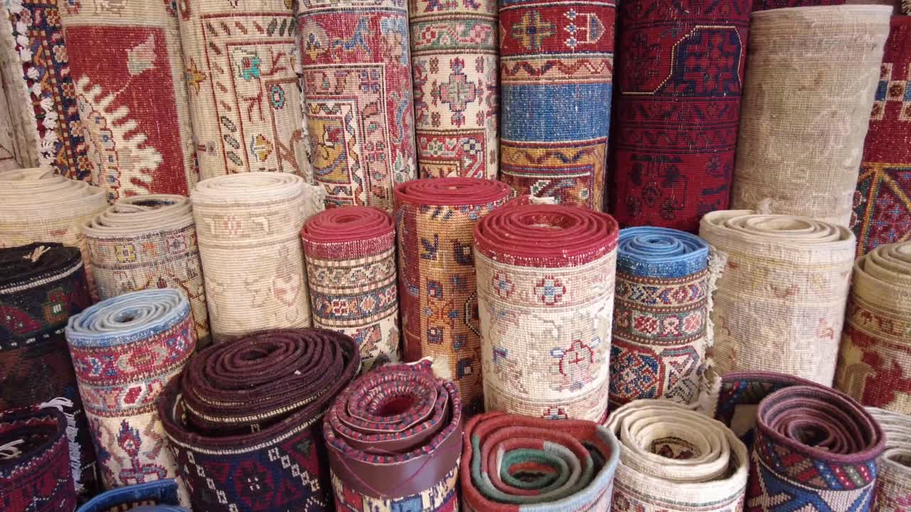 Rolled Rugs Display in a Store