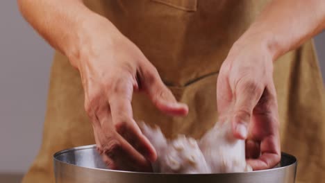 chef preparing raw octopus
