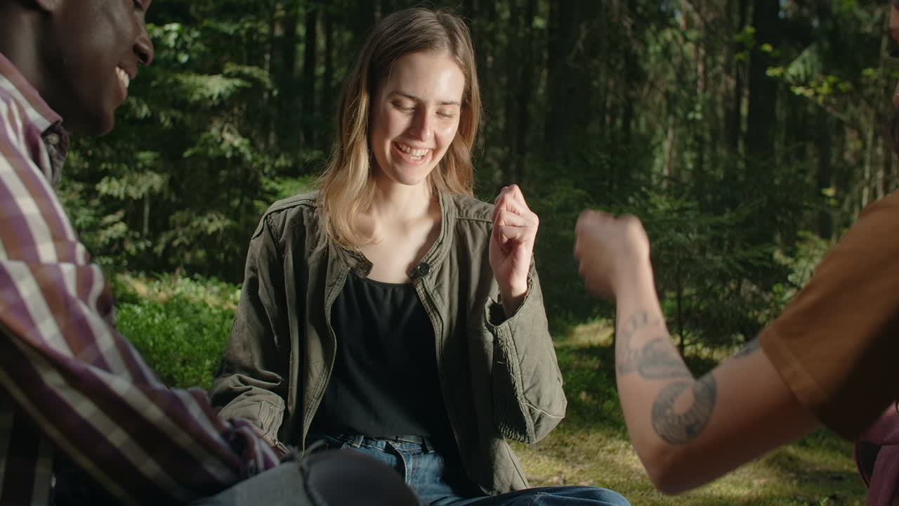Friends Playing a Game in the Forest