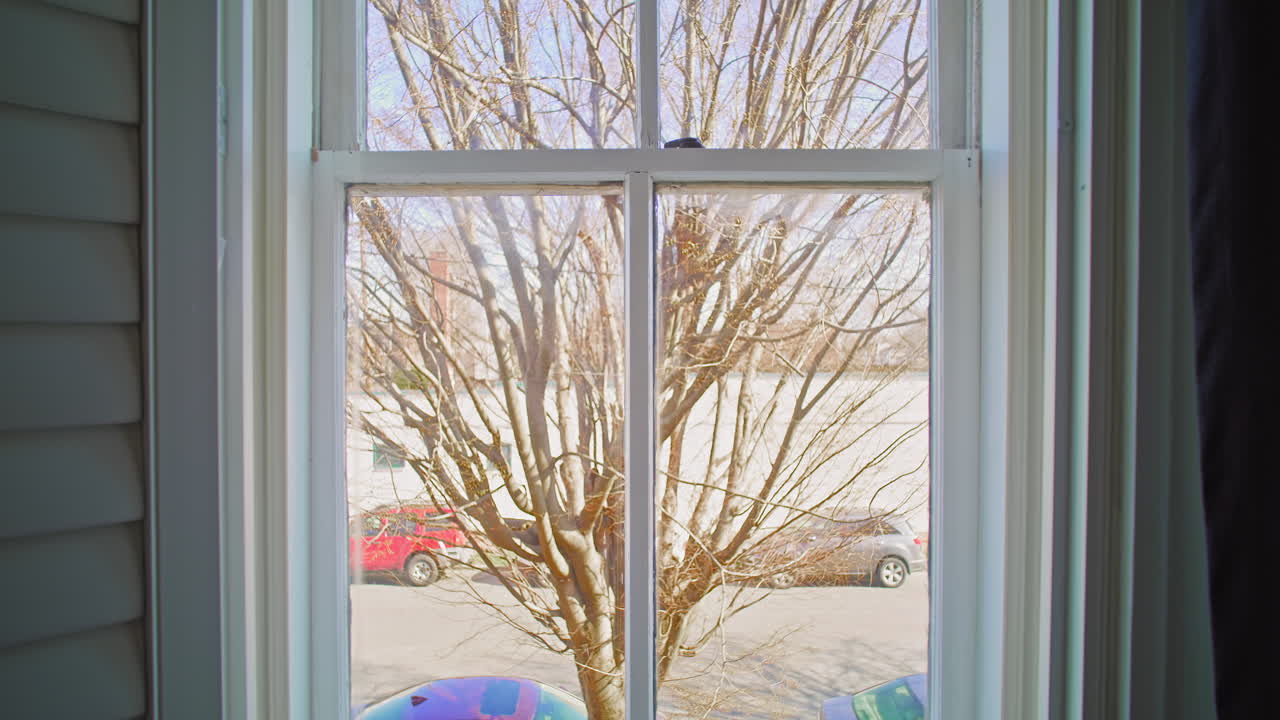 Gimbal shot looking through the window outside