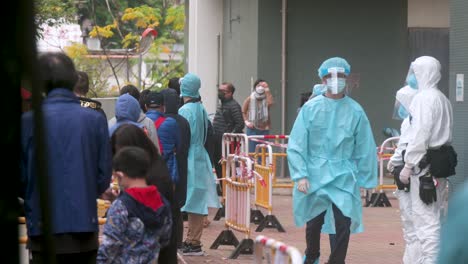 Health-workers-organize-residents-to-go-through-Covid-19-Coronavirus-mass-testing-as-a-public-housing-complex-is-placed-under-lockdown-after-a-large-number-of-residents-tested-positive