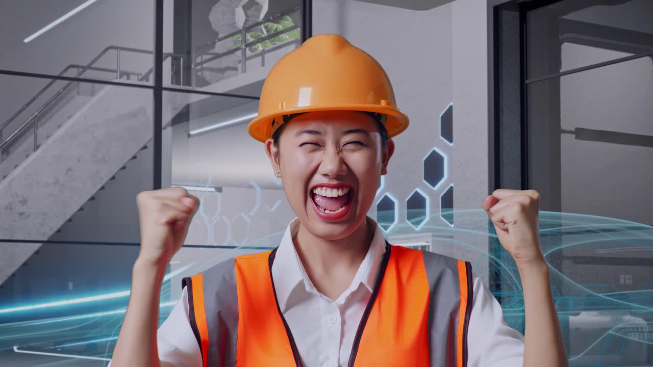 성공한 엔지니어가 현대적인 사무실에서 프로젝트 완료를 축하합니다.