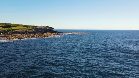 Tourists-Walking-At-Shark-Point-Peninsula-In-Summer