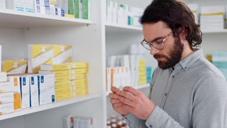 patient reading pharmacy medication box