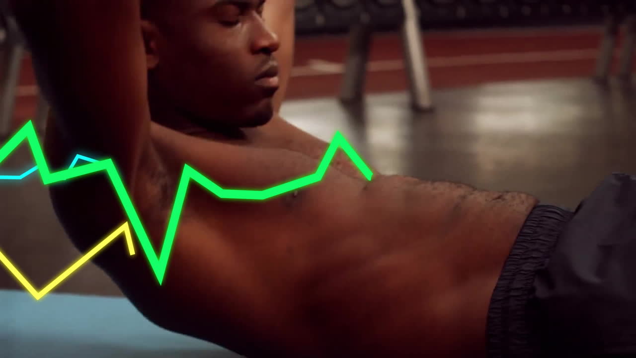 Animation of diagrams over biracial man exercising at gym