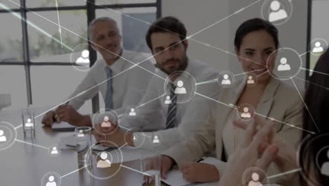 animation of network of connections over diverse colleagues having meeting in office