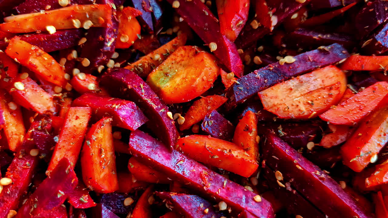 Spicy vegetable mix of carrots and beetroots, coated with chili flakes and spices