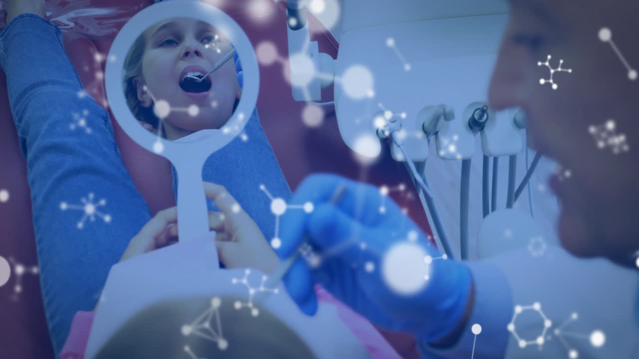 Animation of molecules over caucasian male dentist and female patient
