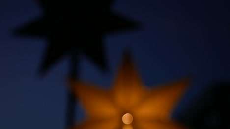 Blurred-Static-close-up-of-star-silhoutte-in-window