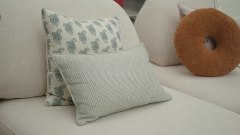 pillows on a white sofa