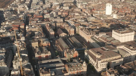 circling aerial shot around covent garden central london