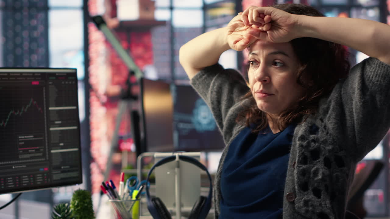 Day trader feeling worried and stressed looking at monetary losses