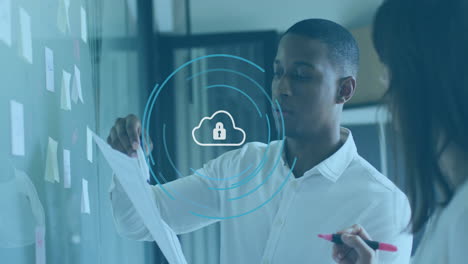 discussing documents, business professionals with cloud security animation in office meeting