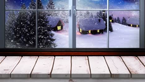 Animation-Einer-Winterlichen-Weihnachtslandschaft-Mit-Schnee,-Der-über-Bäume-Und-Häuser-Fällt-Und-Durch-Das-Fenster-Gesehen-Wird