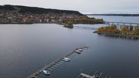 islands of frösön and östersund connected by a narrow bridge in lake storsjön sweden - aerial shot