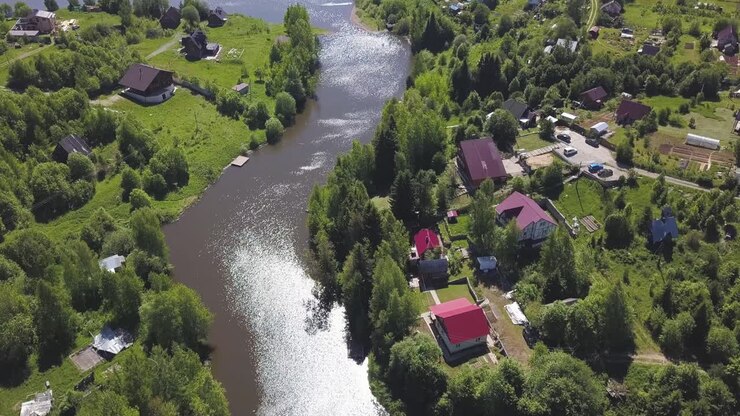 Aerial view of a rural village by a river