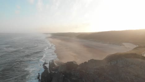 Early-morning-sunrise-on-a-lonely-beach-in-Portugal