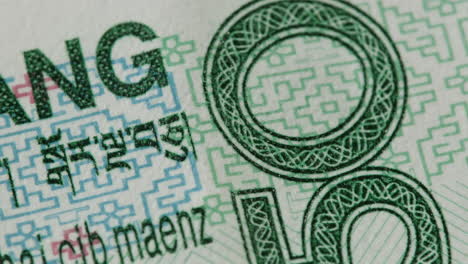 close-up of ang currency note